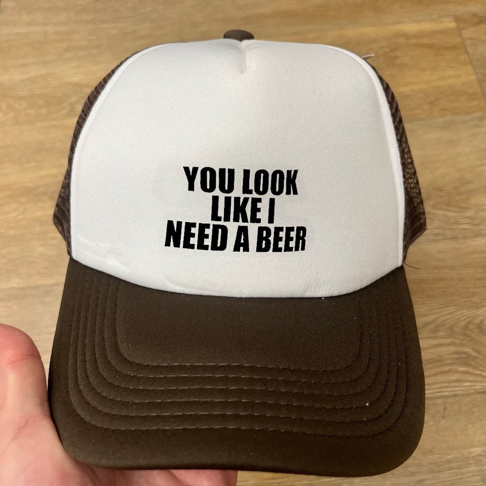 You Look Like I Need a Beer Black Trucker Hat